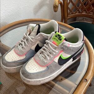 Nike Gray and Pink Sneakers with Classic Design